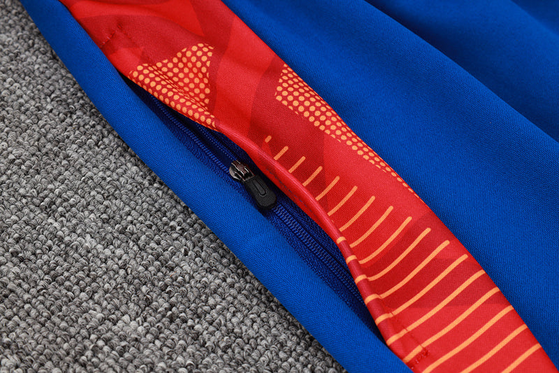 Tuta Sport Bianco e Azzurro dettagli arancioni