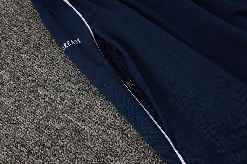 Tuta Sport Blu dettagli Azzurri