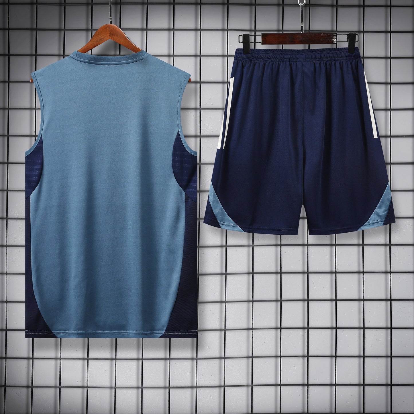 Arsenal blu scuro completo con canottiera