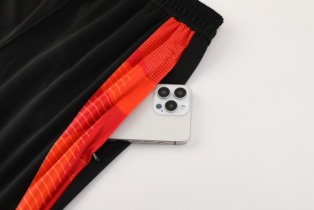 Tuta Sport rosso e arancione