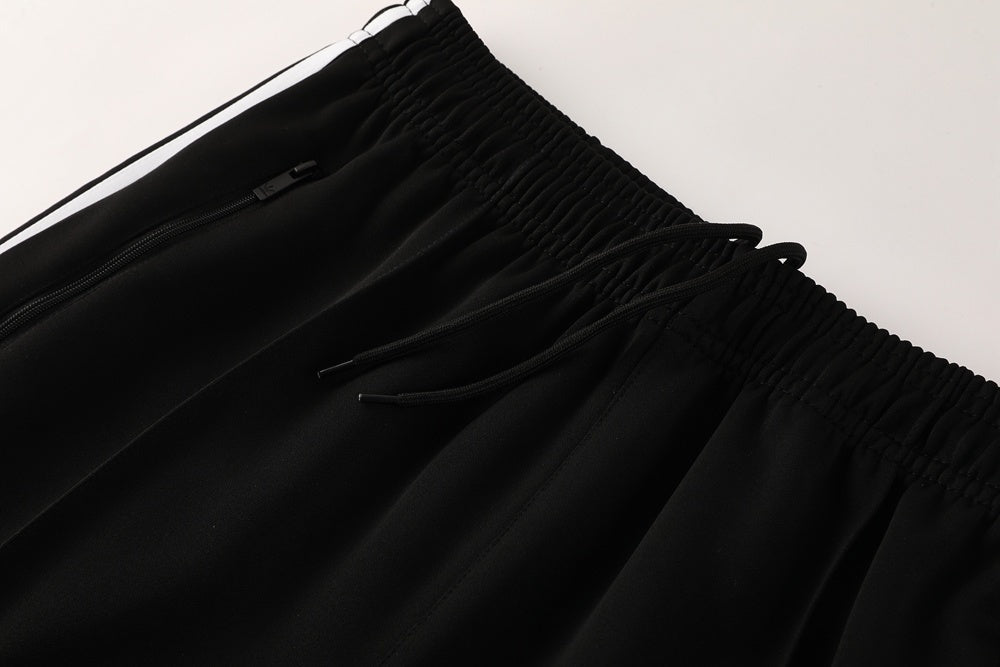 Tuta Sport nero colletto bianco