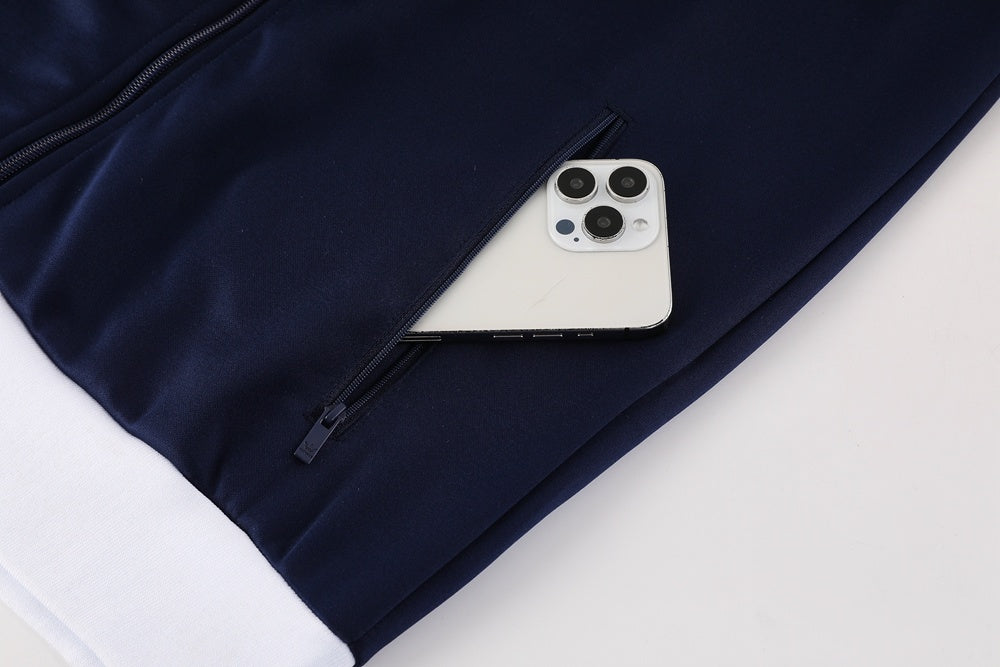 Tuta Sport blu colletto bianco