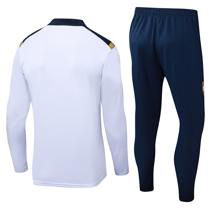 Tuta Sport Bianco e Blu dettagli Gialli