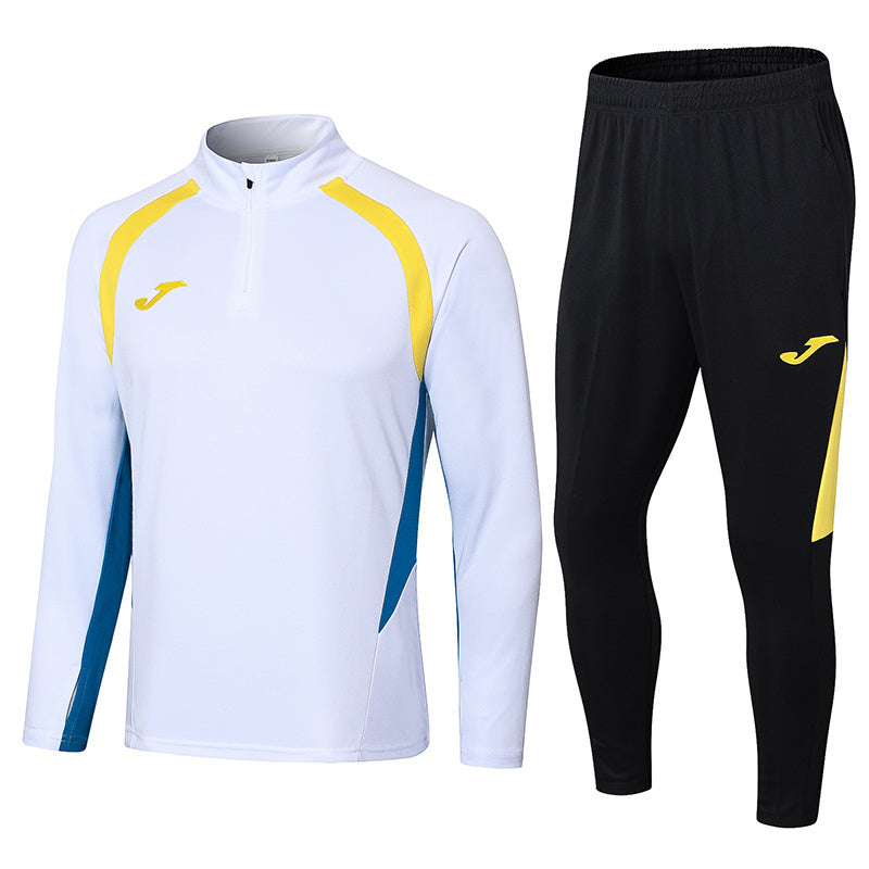 Tuta Sport Bianco e Nero dettagli Gialli e Azzurri