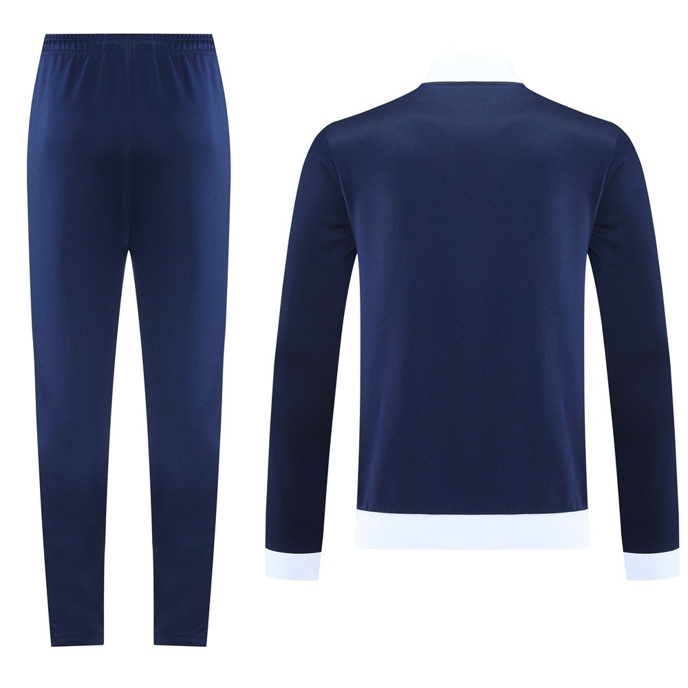 Tuta Sport blu colletto bianco