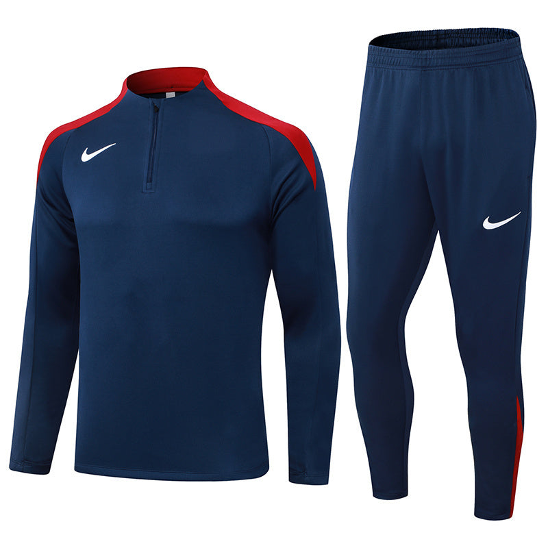 Tuta Sport Blu dettagli rossi