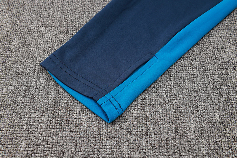 Tuta Sport Blu dettagli Azzurri e Gialli