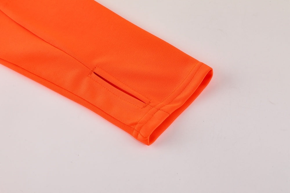 Tuta Sport arancione animalier