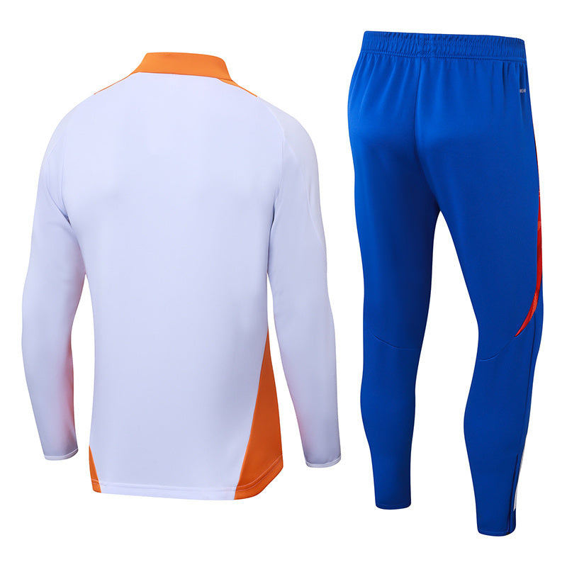Tuta Sport Bianco e Azzurro dettagli arancioni