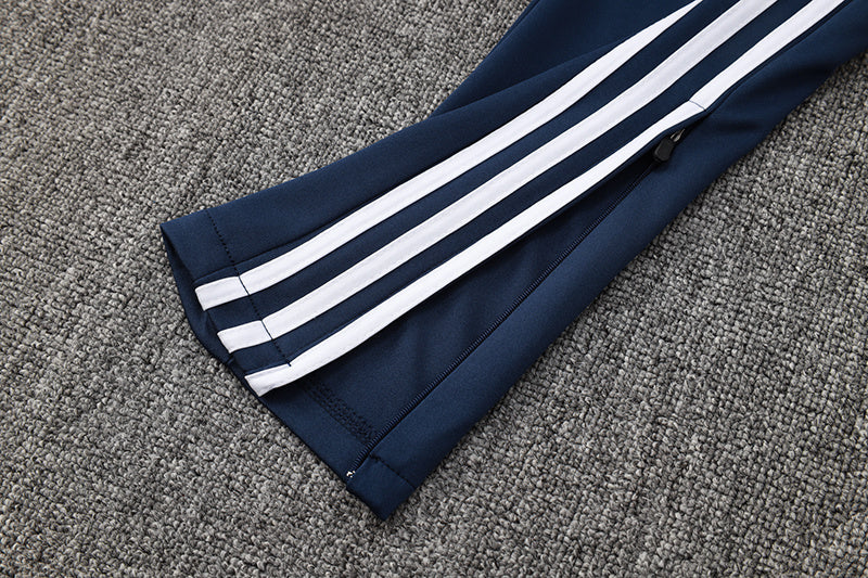 Tuta Sport Blu riga Rossa