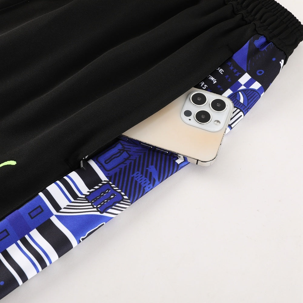 Tuta Sport nero e blu fantasy