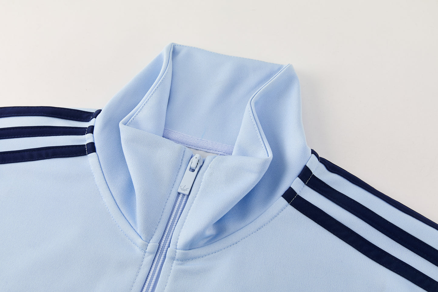 Tuta Sport Celeste Logo Schiena