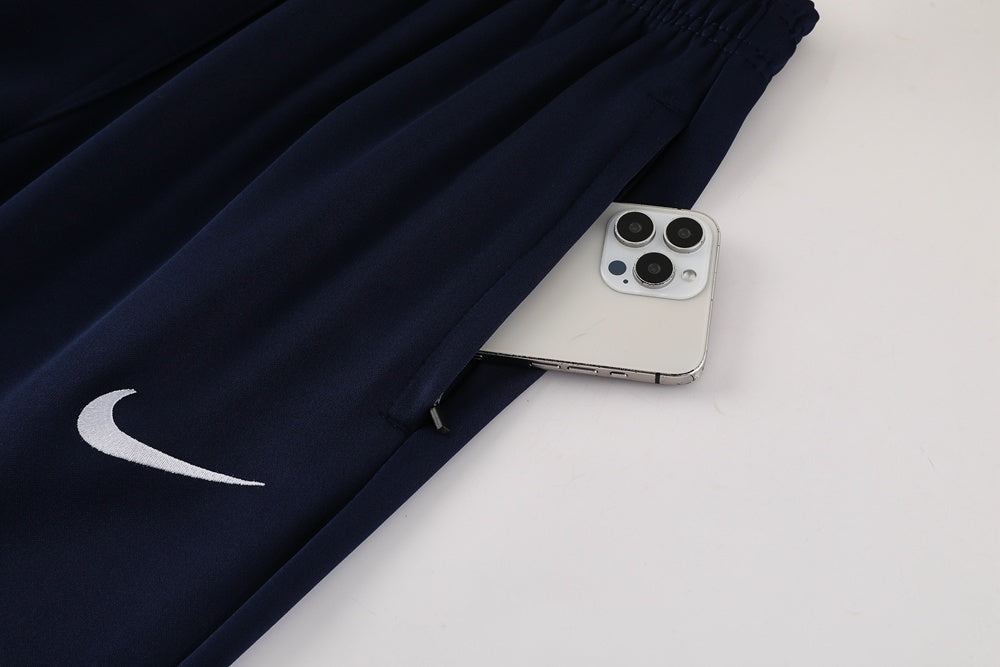 Tuta Sport blu e bordeaux