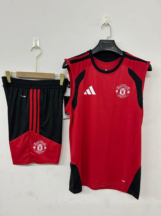 Manchester united completo rosso con canottiera