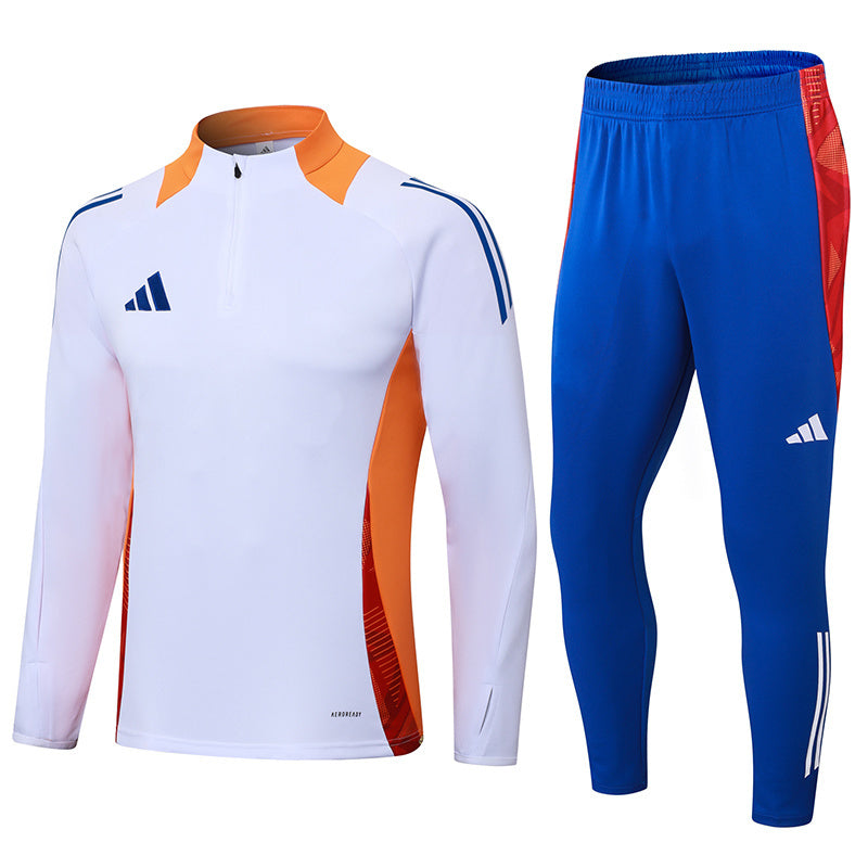 Tuta Sport Bianco e Azzurro dettagli arancioni