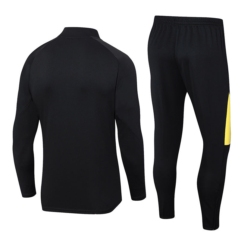 Tuta Sport Nero dettagli Gialli