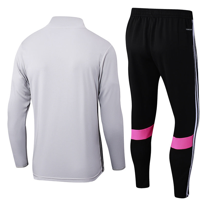 Tuta Sport Bianco striscia Rosa
