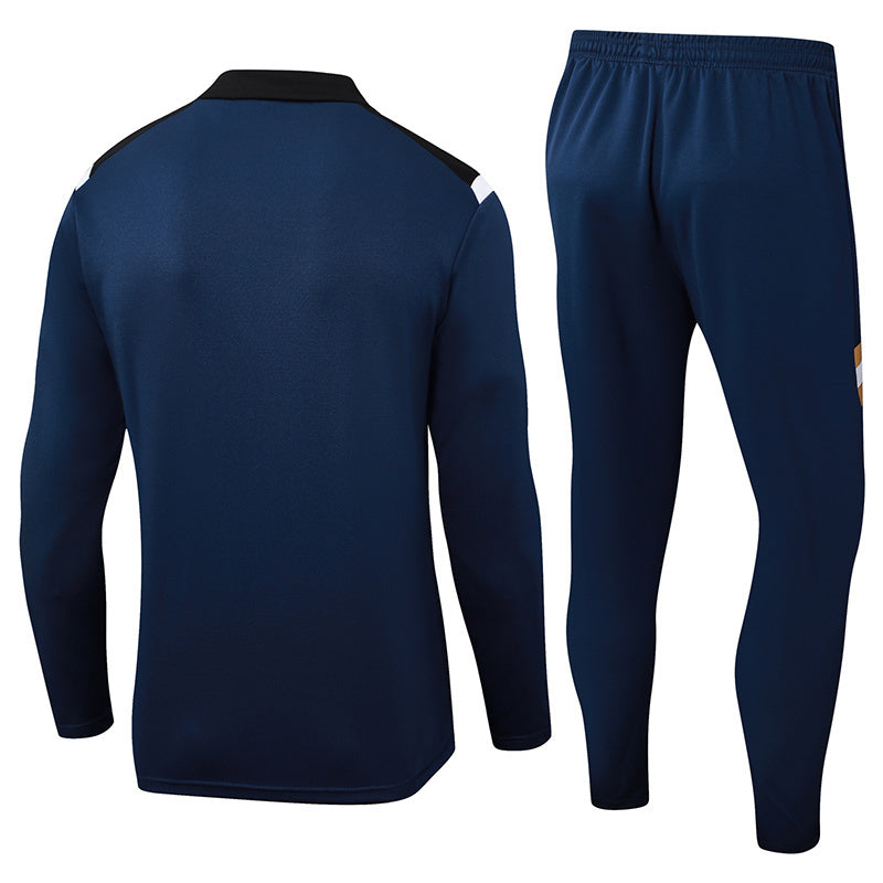 Tuta Sport Blu dettagli Neri