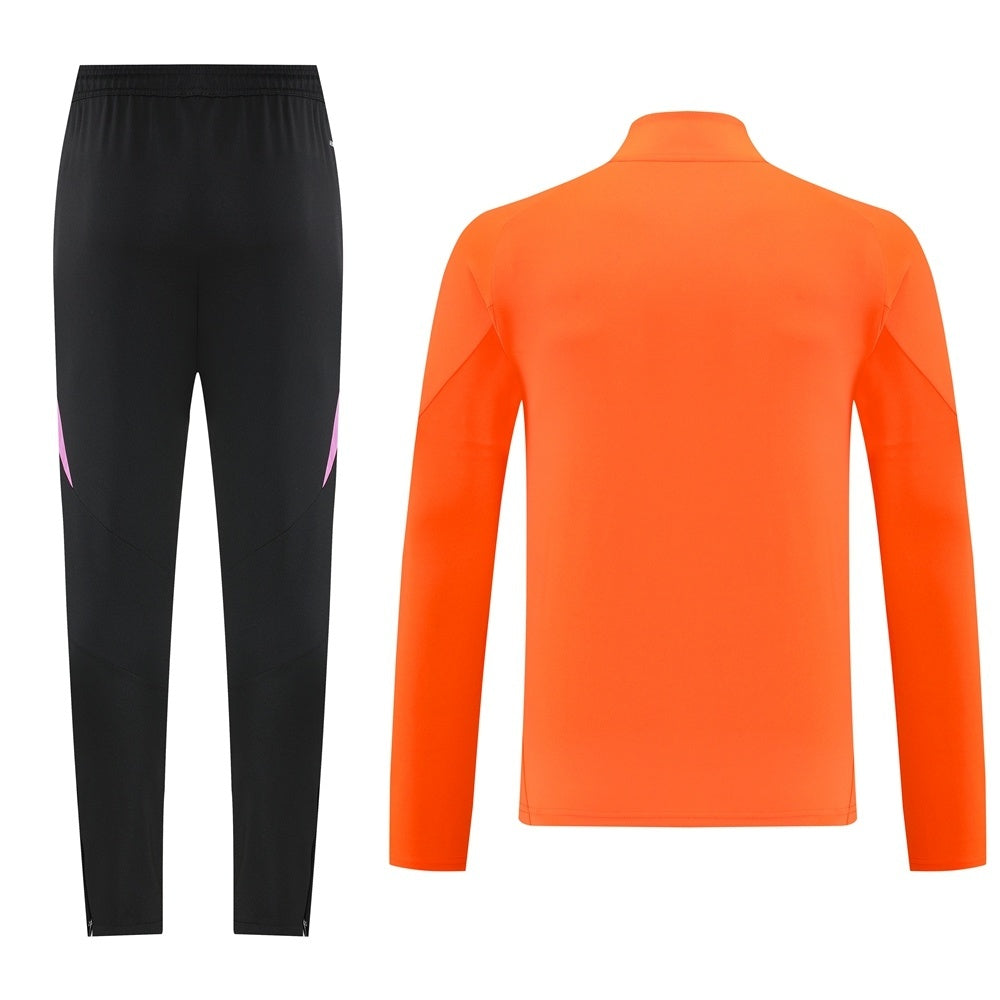 Tuta Sport arancione animalier